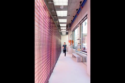 A male customer running in the New York On store to analyse his running style